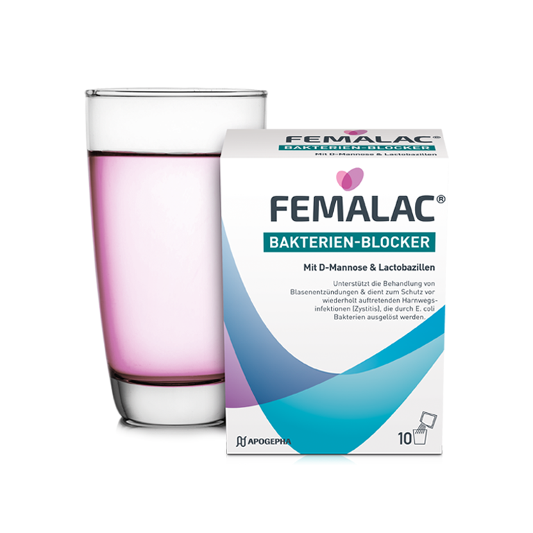 Zur Behandlung einer Blasenentzündung: FEMALAC® wird in der Apotheke von einer lächelnden Mitarbeiterin verkauft.